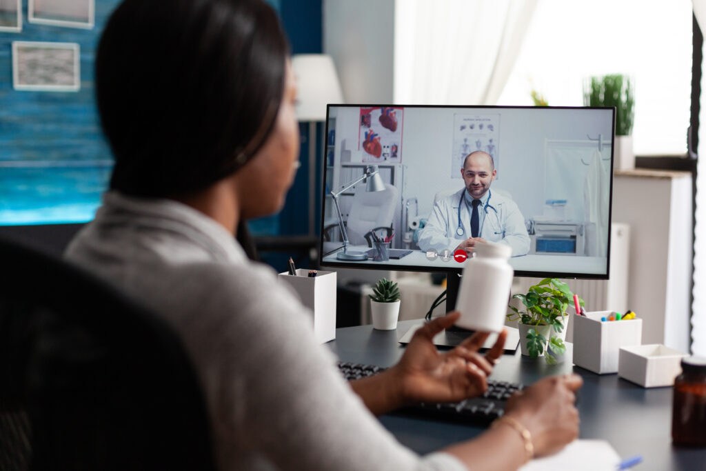 Telehealth billing denials mental health provider reviewing virtual session claim errors